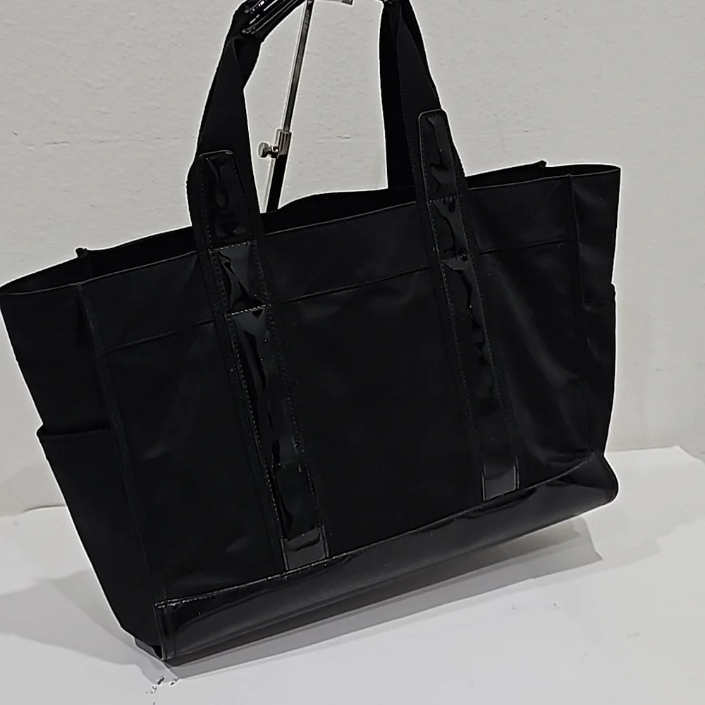 Tory Burch Big Nylon Black Handbag with patent leather triming and logo